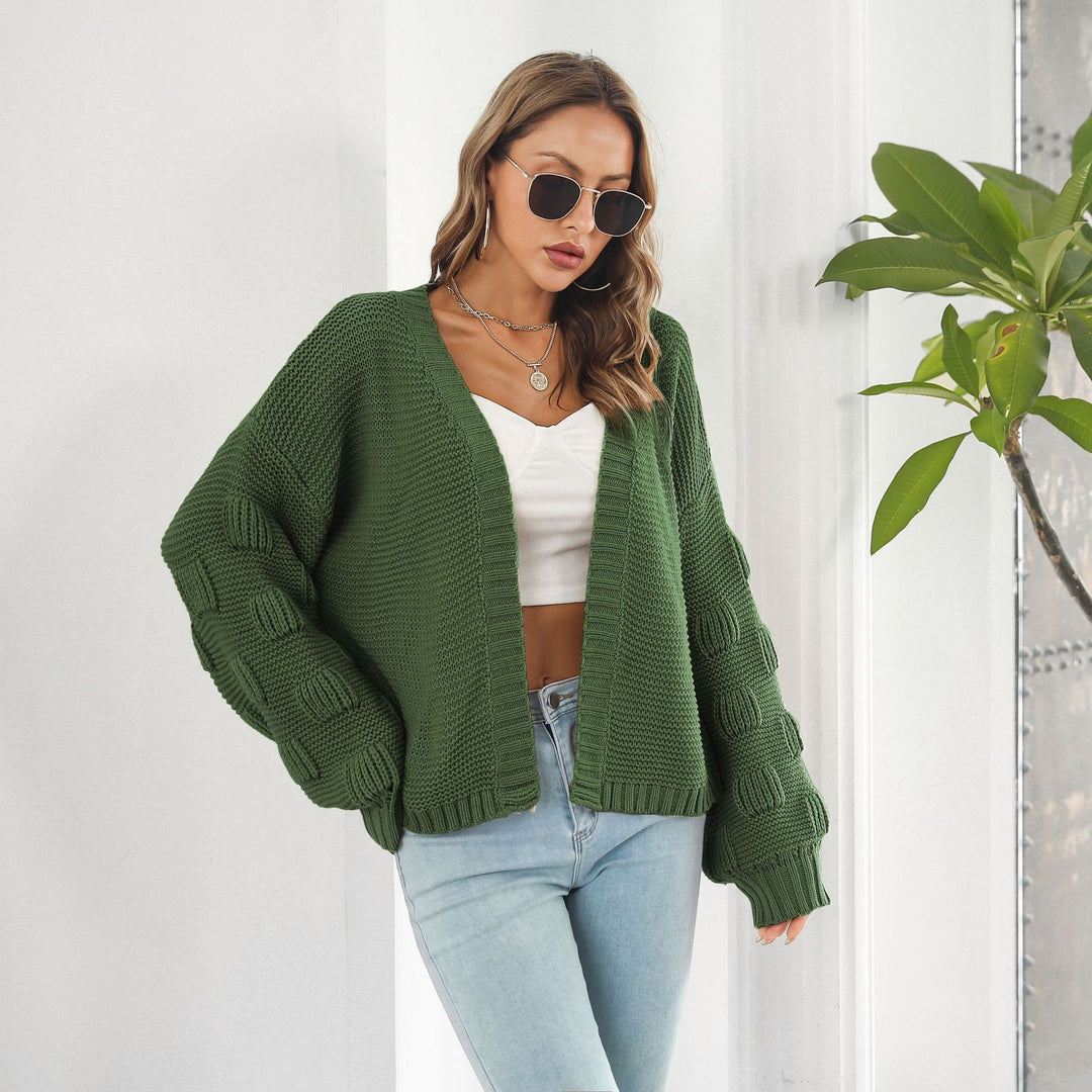 Kort grofgebreid vest met pofmouwen