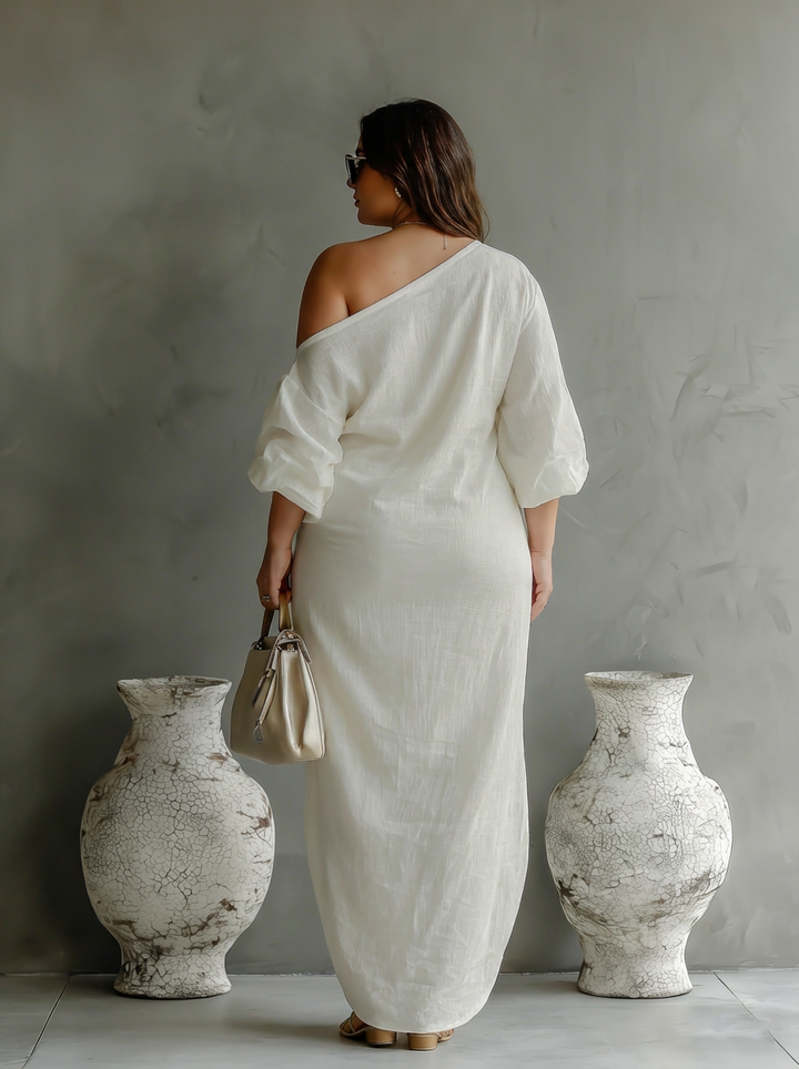 Elegante Vloeiende Jurk in Ivoorwit met Off-Shoulder