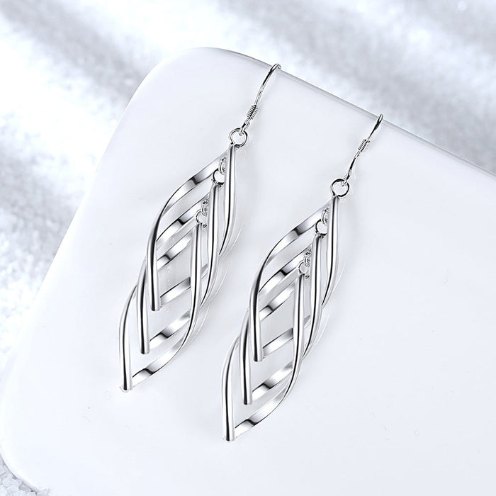 Gwendolyn Wave Solenne Oorbellen | Wit Goud