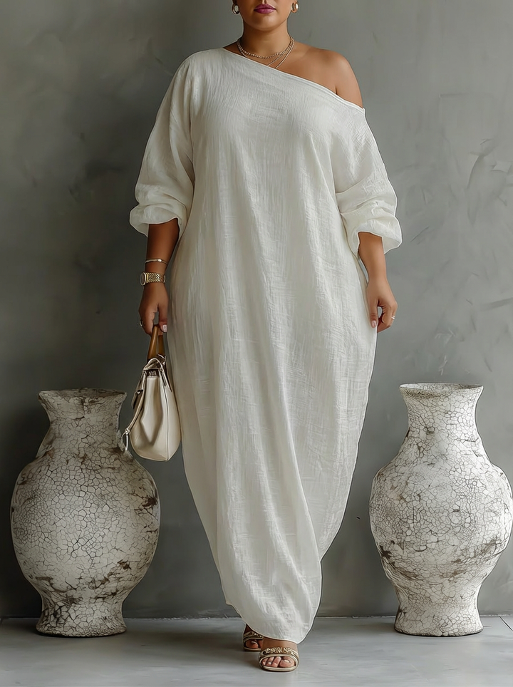 Elegante Vloeiende Jurk in Ivoorwit met Off-Shoulder