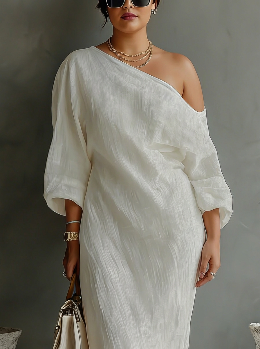 Elegante Vloeiende Jurk in Ivoorwit met Off-Shoulder
