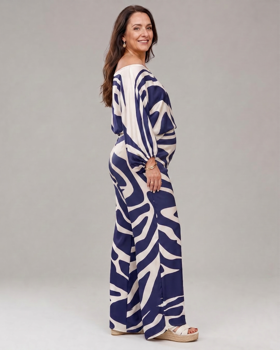 Calliope | Abstracte Print Off Shoulder Top en Brede Pantalon Set