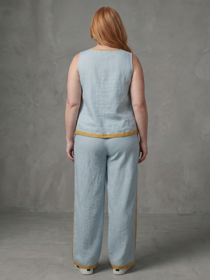 Yasmin | Mouwloze Top Set met Wijde Broek en Contrasterende Details