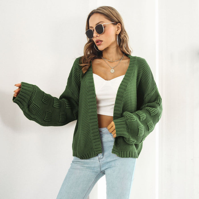 Julia | Grofgebreid kort vest met pofmouwen