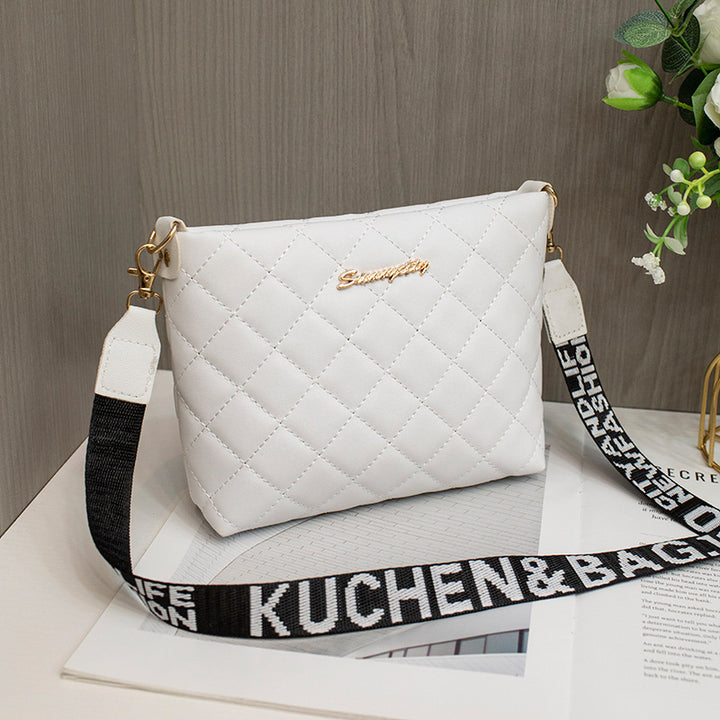 Zwart gewatteerd crossbody tasje met brede band