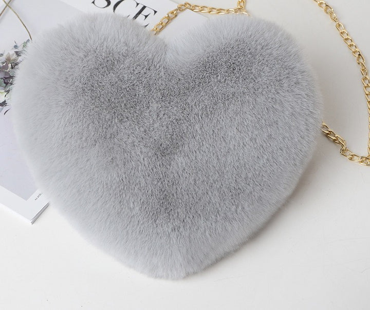 Hartvormige pluche tas met gouden ketting