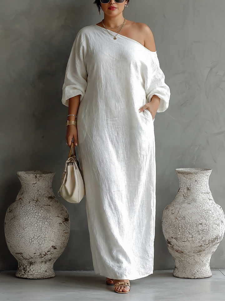 Elegante Vloeiende Jurk in Ivoorwit met Off-Shoulder