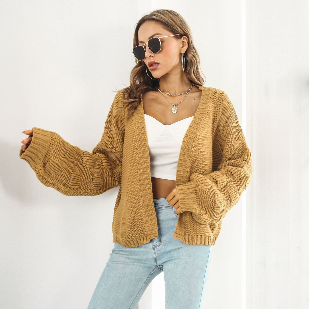 Kort grofgebreid vest met pofmouwen