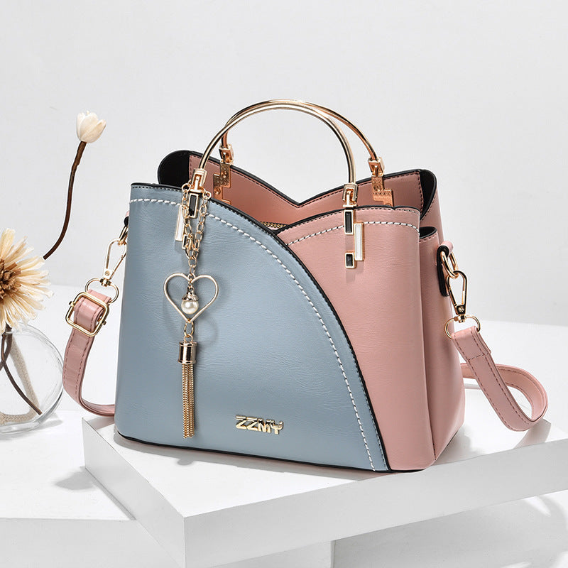 Colour block handtas met hartje