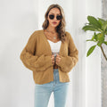 Kort grofgebreid vest met pofmouwen