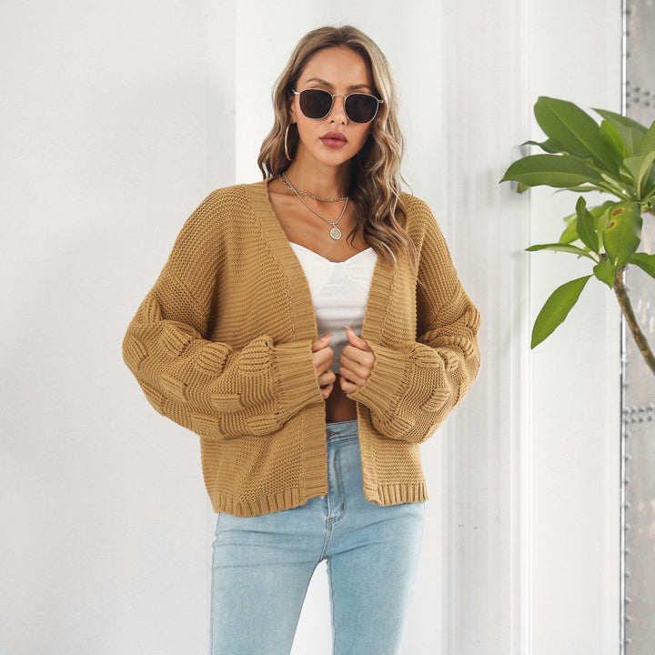Kort grofgebreid vest met pofmouwen