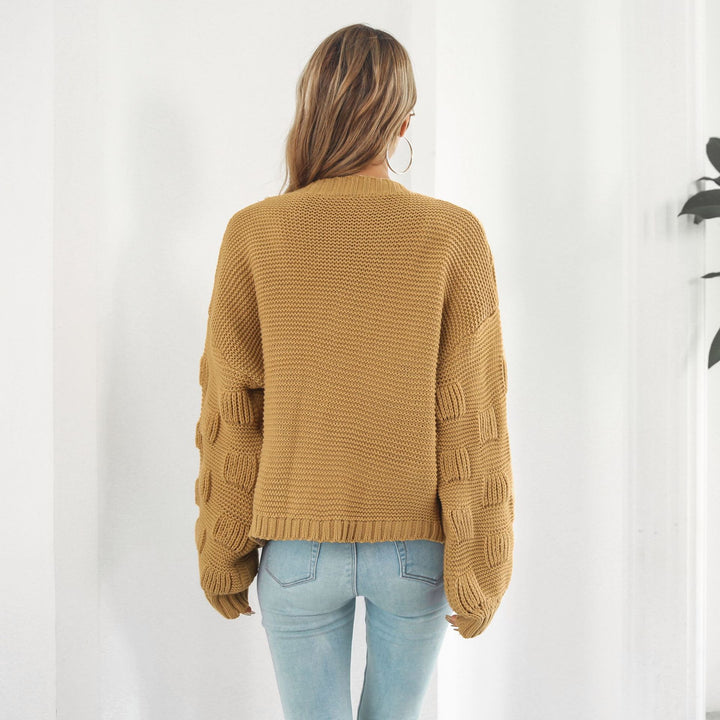 Kort grofgebreid vest met pofmouwen